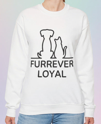 Person wearing a white sweatshirt with 'FURREVER LOYAL' text with dog and cat graphics on a pastel background