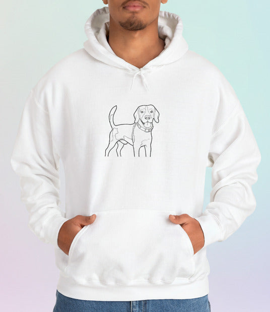 Person wearing a white hoodie with a dog illustration on a pastel background