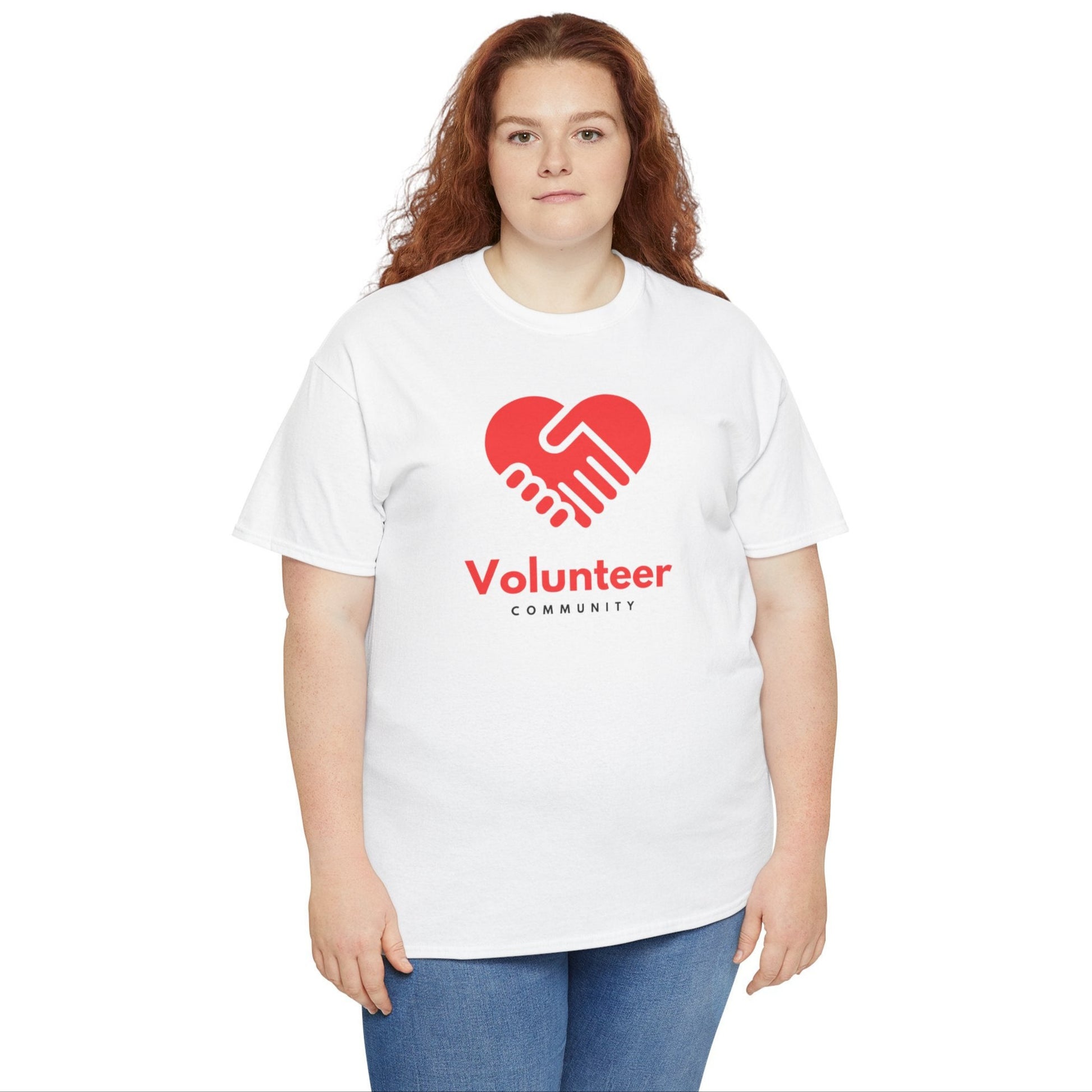 Person wearing a white t-shirt with a red heart and 'Volunteer Community' text on a white background