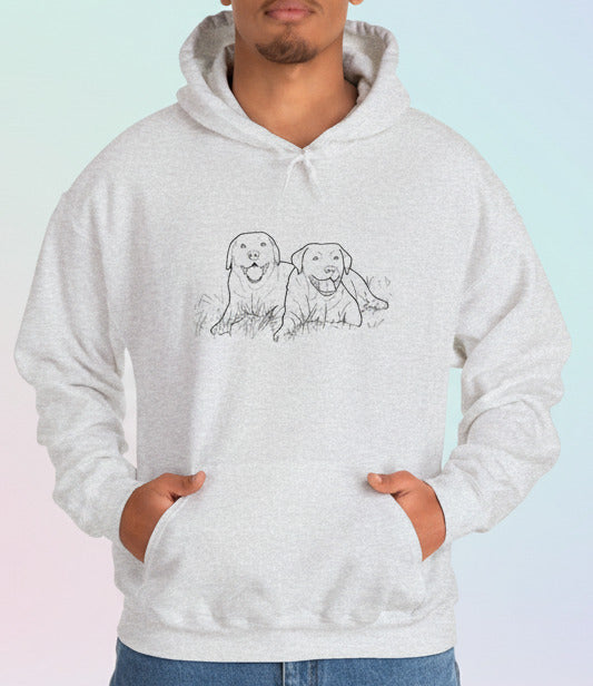 Person wearing a white hoodie with dog illustrations on a pastel background