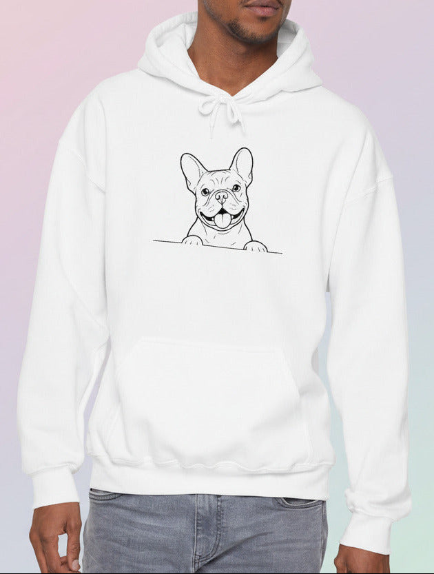 Man wearing a white hoodie with a dog graphic on a pastel background