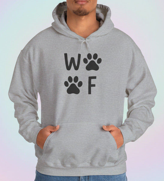 Person wearing a gray hoodie with 'WOOF' printed on it against a white background